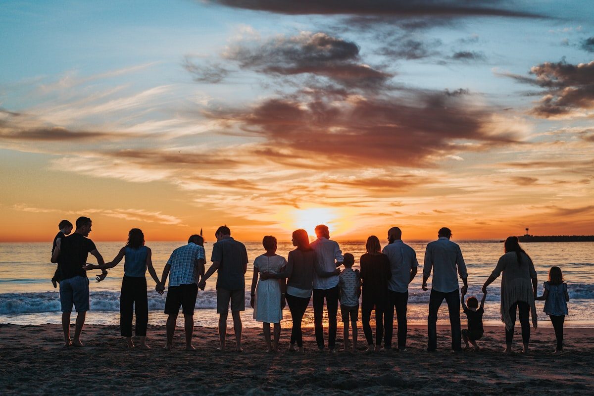 Family together at sunset